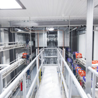Fluid Milk Packaging Room Entry into Product Conveyor Bridge